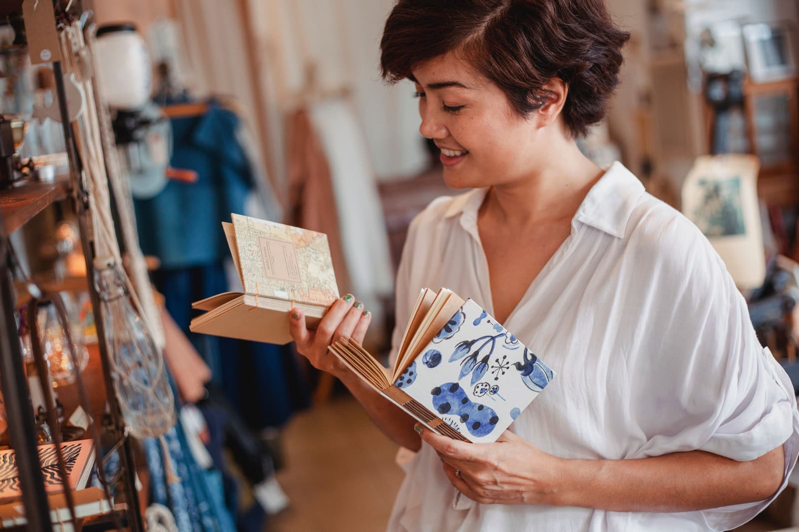 A person choosing a gift while shopping in a bright store